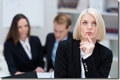 Beautiful thoughtful business woman